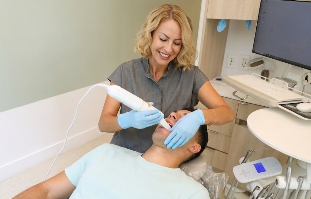 Dental hygienist providing a comfortable professional clean at Nest Dental