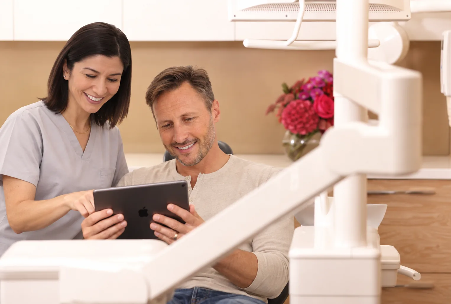 Nest Dental dentist reviewing a smile plan with a patient
